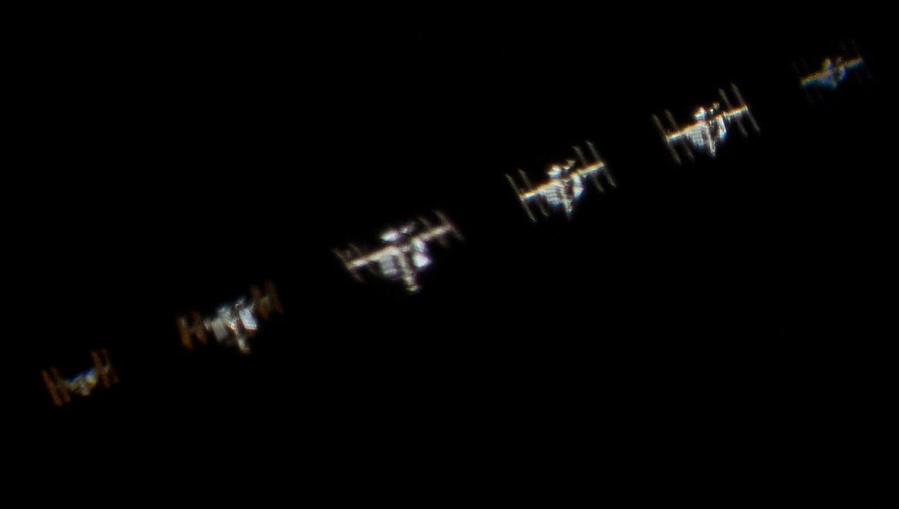 iss space station seen through telescope